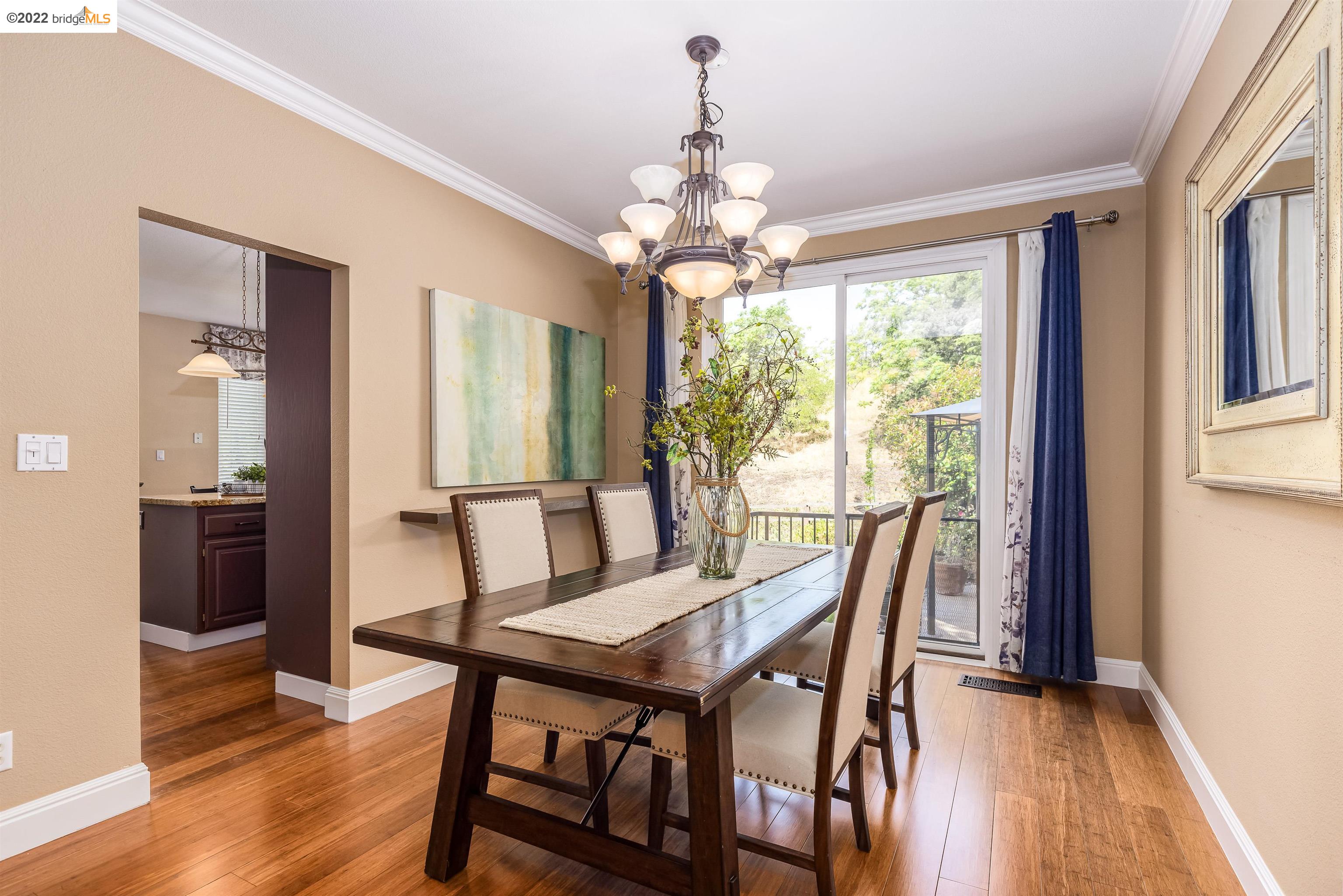 Undisclosed Address Concord, CA 94521 - Photo 9 of 47 a view of a dining room with furniture window and wooden floor