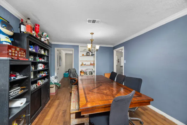 a kitchen with stainless steel appliances granite countertop a refrigerator oven a sink and dishwasher