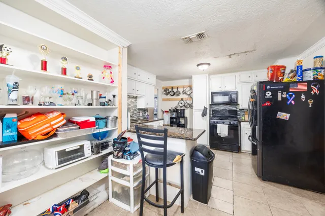 a room with storage and utility