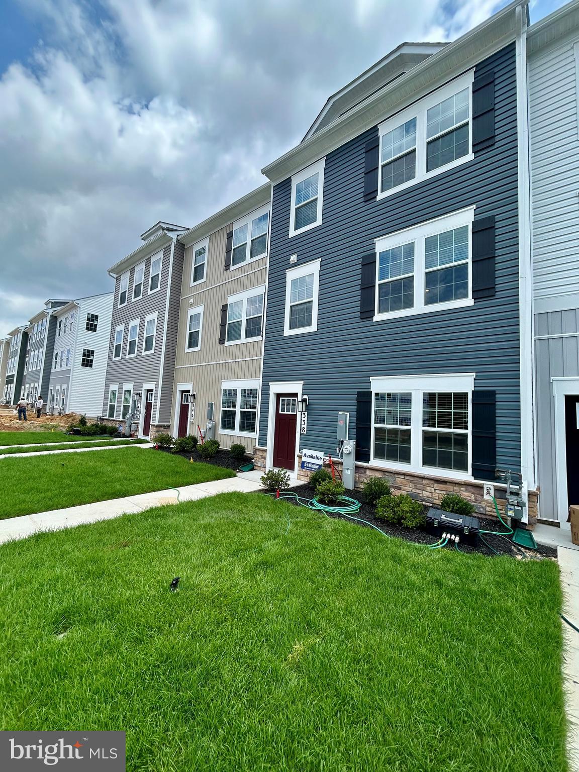 338 Hackley Drive Joppa, MD 21085 - Photo 2 of 32 a view of a building with a yard
