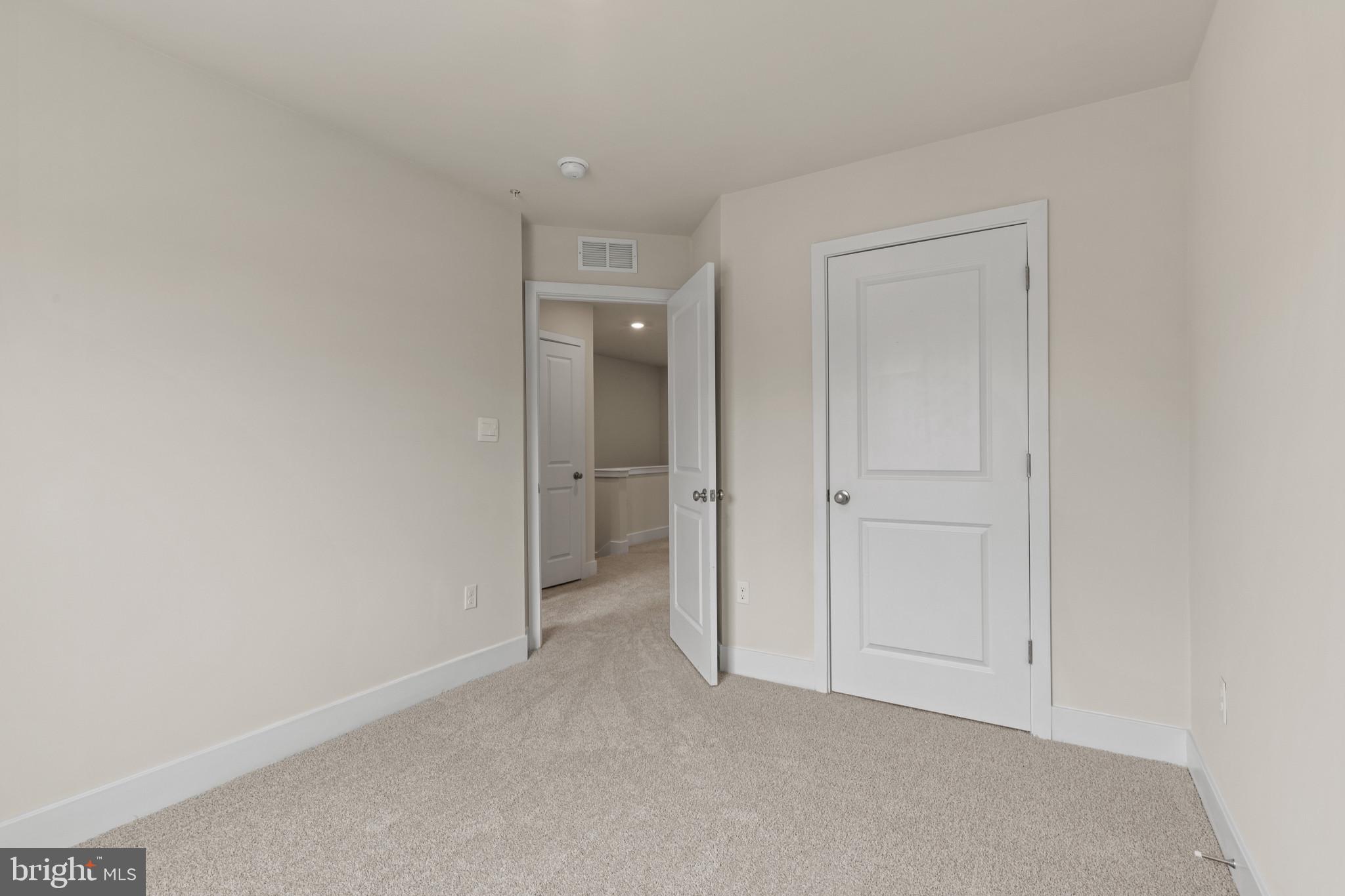 338 Hackley Drive Joppa, MD 21085 - Photo 21 of 32 a view of an empty room and closet area