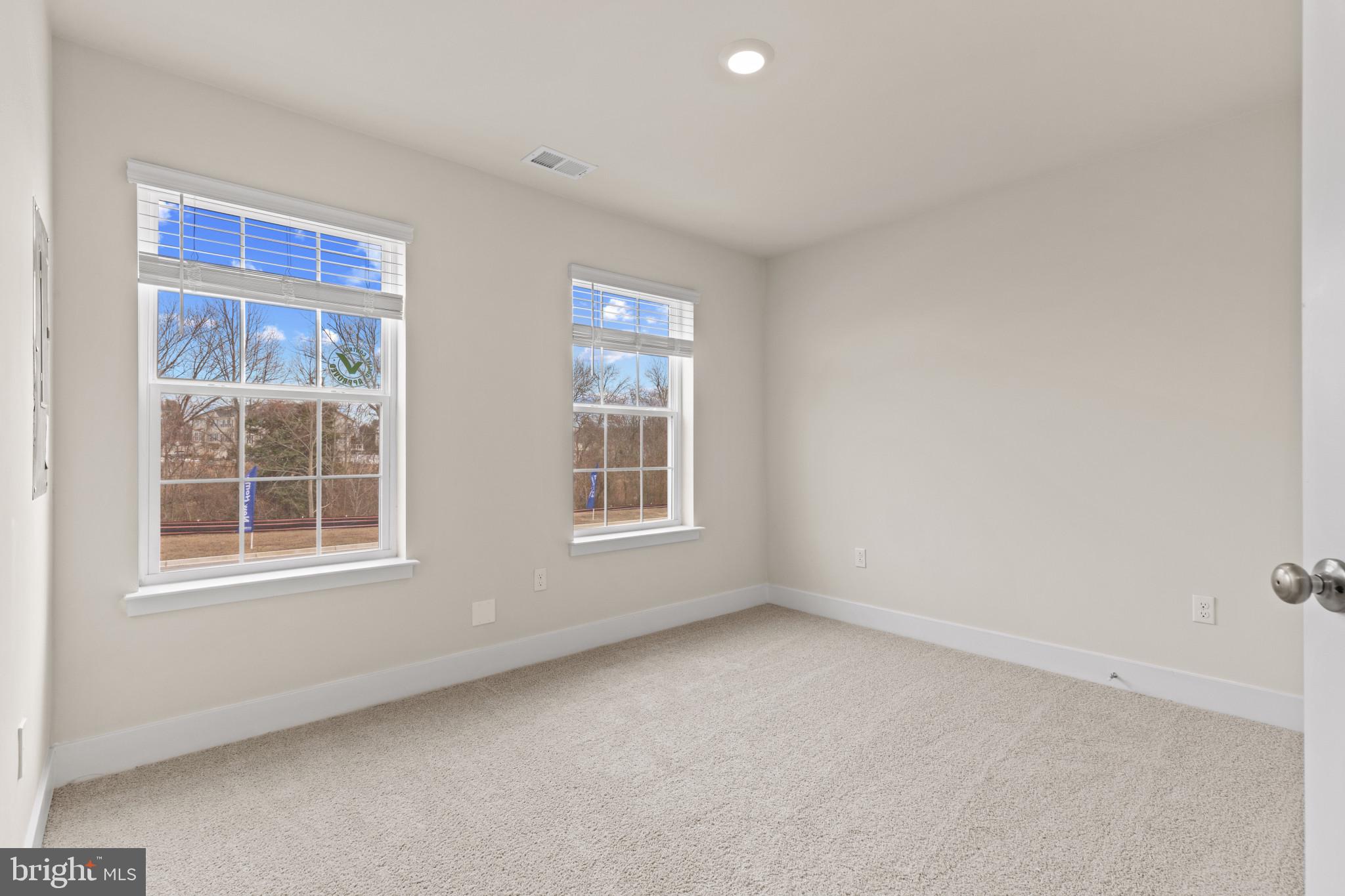 338 Hackley Drive Joppa, MD 21085 - Photo 4 of 32 an empty room with a window