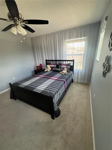 a view of a livingroom with furniture and wooden floor