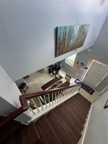 a room with gym equipment and a table