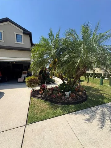 a view of a lake with houses in the back
