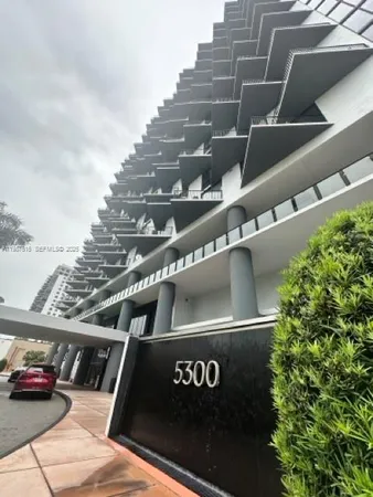 a view of balcony with furniture