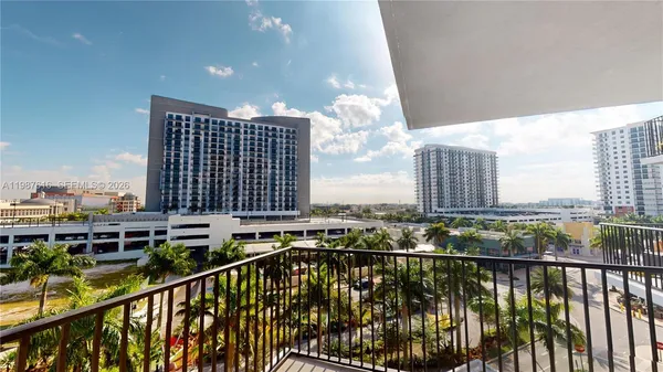a view of balcony with furniture