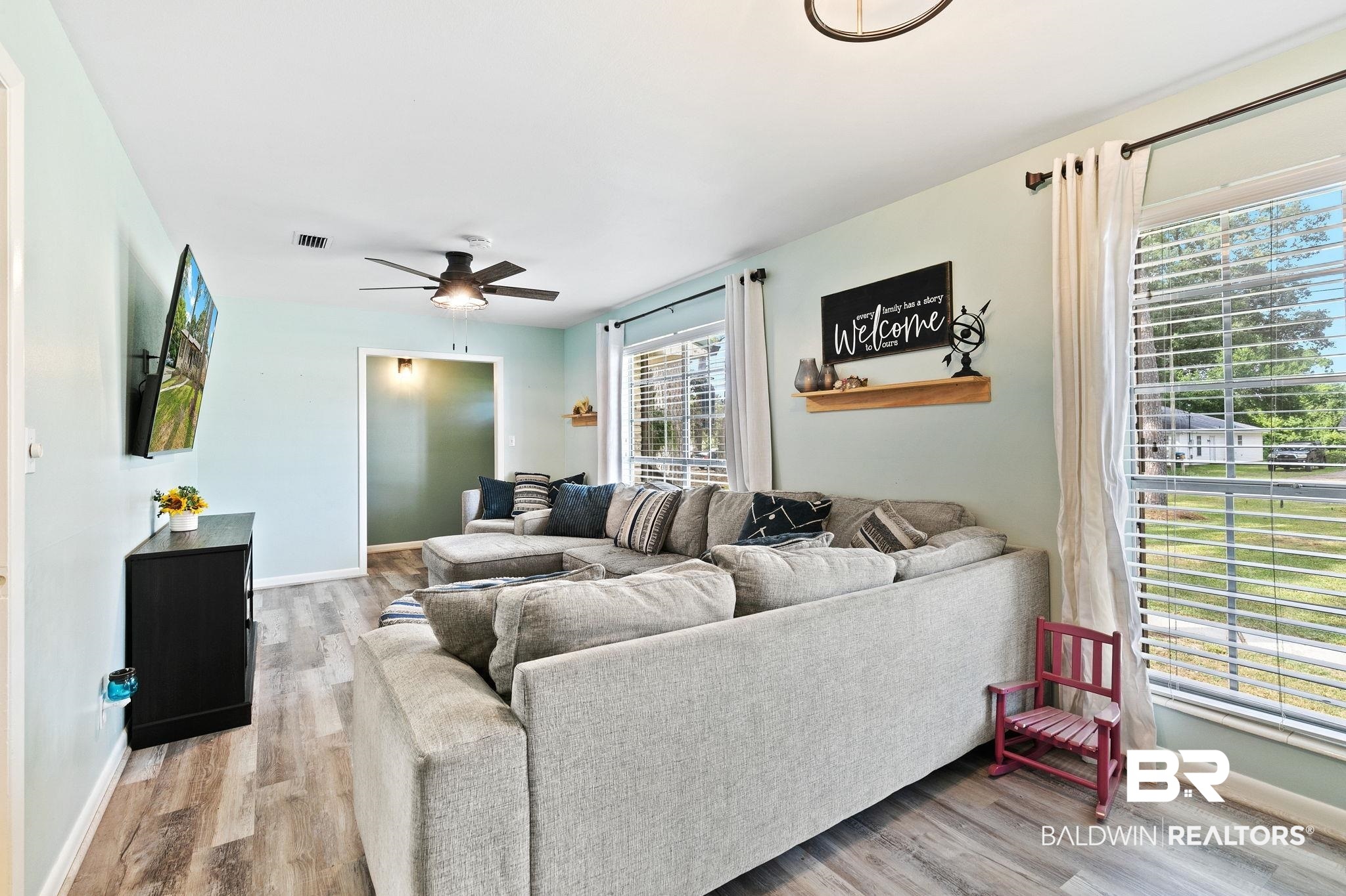 14 Lee Circle Daphne, AL 36527 - Photo 23 of 83 Living room featuring wood-type flooring and ceiling fan