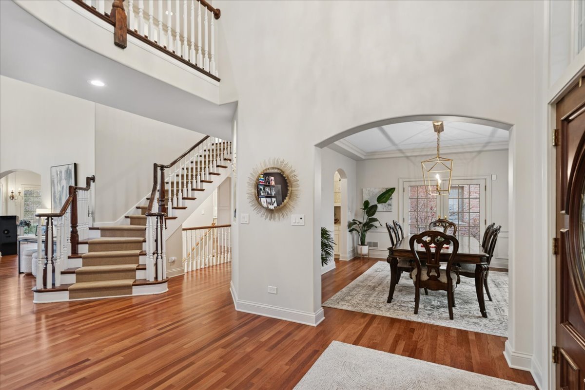 14840 Creekside Path Green Oaks, IL 60048 - Photo 11 of 35 a view of a dining room with furniture and wooden floor