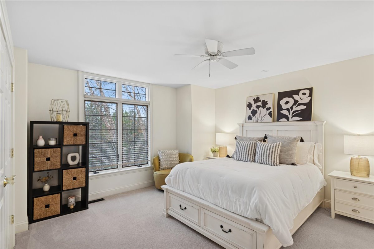 14840 Creekside Path Green Oaks, IL 60048 - Photo 25 of 35 a bedroom with a large bed and a window