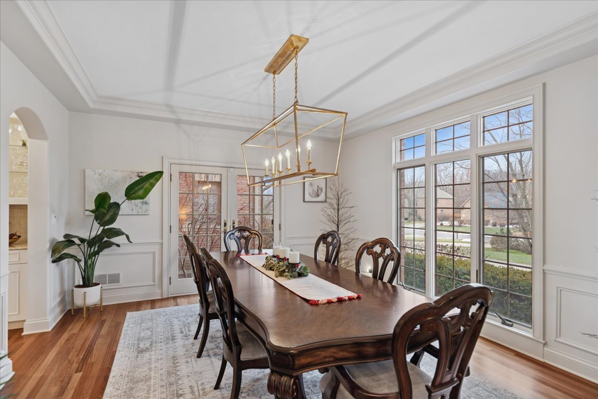 14840 Creekside Path Green Oaks, IL 60048 - Photo 6 of 35 a view of a dining room with furniture window and wooden floor