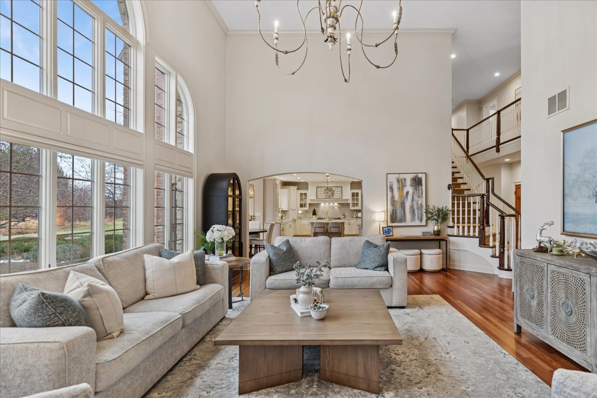 14840 Creekside Path Green Oaks, IL 60048 - Photo 8 of 35 a living room with furniture or couch and a chandelier