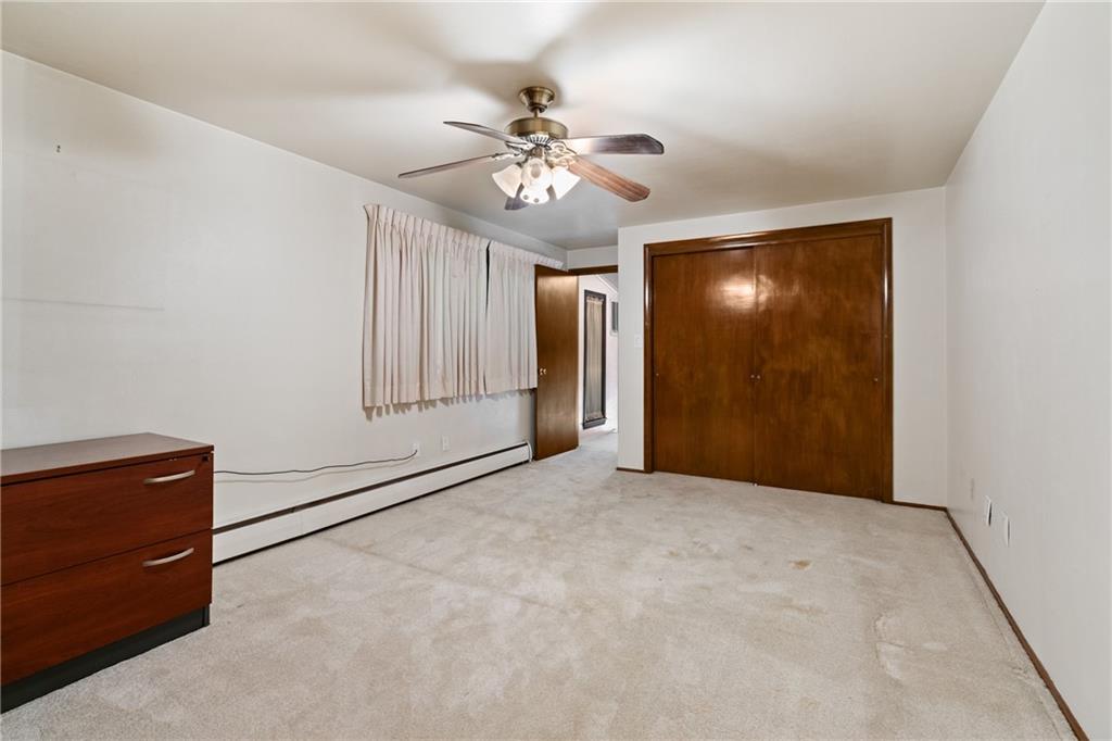 500 Allenby Avenue Pittsburgh, PA 15218 - Photo 13 of 35 an empty room with closet and fan