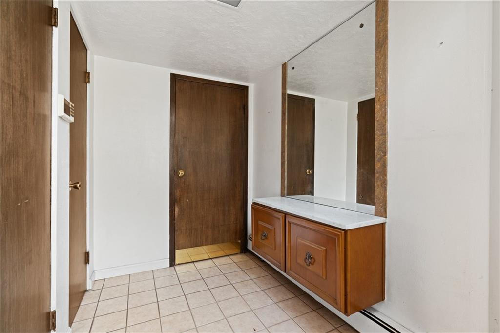 500 Allenby Avenue Pittsburgh, PA 15218 - Photo 2 of 35 a view of a hallway with front door