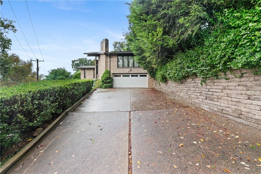500 Allenby Avenue Pittsburgh, PA 15218 - Photo 28 of 35 a front view of a house with a yard