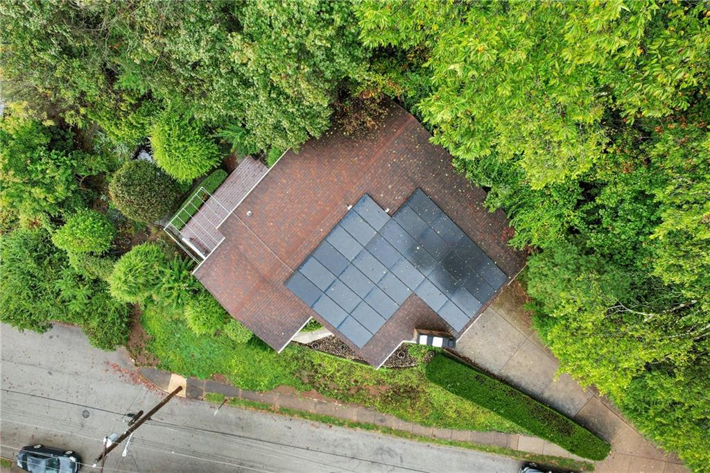 500 Allenby Avenue Pittsburgh, PA 15218 - Photo 30 of 35 an aerial view of a house with a yard and a large tree