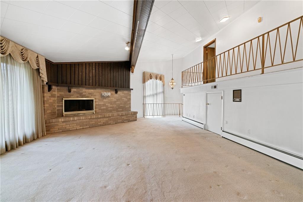 500 Allenby Avenue Pittsburgh, PA 15218 - Photo 7 of 35 a view of livingroom and fireplace