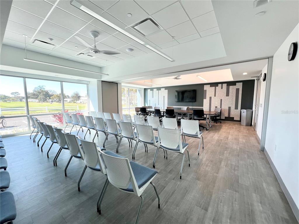 1100 South Belcher Road, Unit 260 Largo, FL 33771 - Photo 70 of 79 a view of a dining room with furniture window and wooden floor
