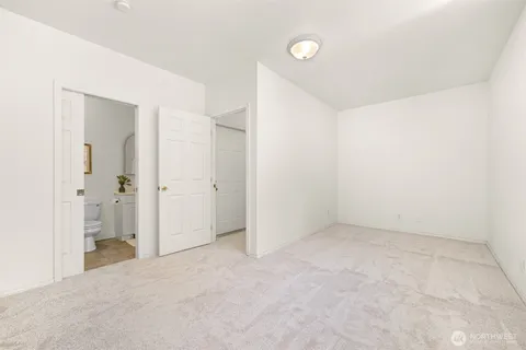 a bathroom with a toilet a sink and a shower