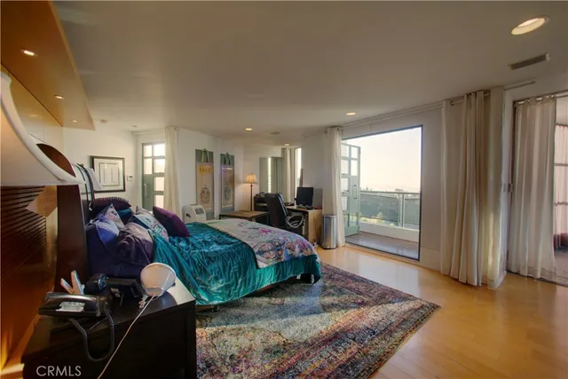 a bed room with a bed and a window