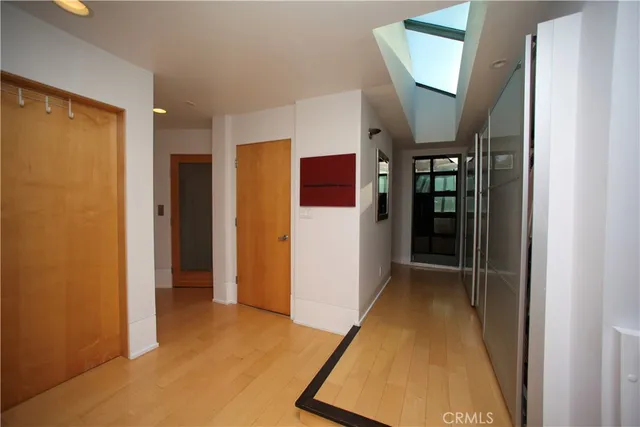 a view of hallway with livingroom