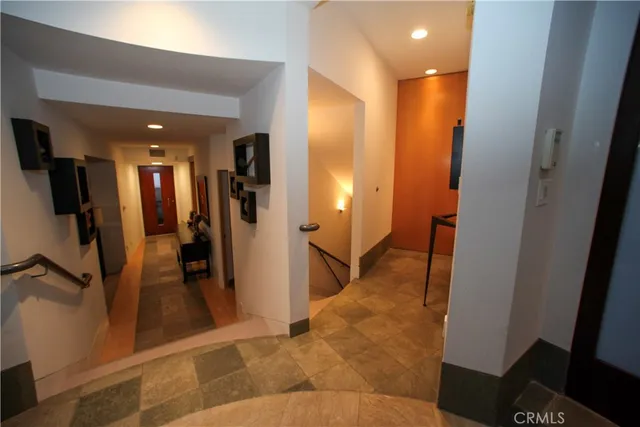 a view of a hallway with a couch