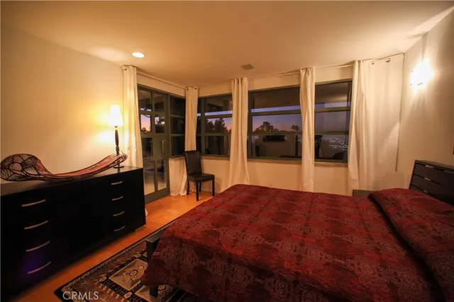 a bed room with a bed and a couch