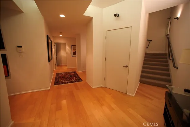 a view of a storage & utility room with sink dryer and washer