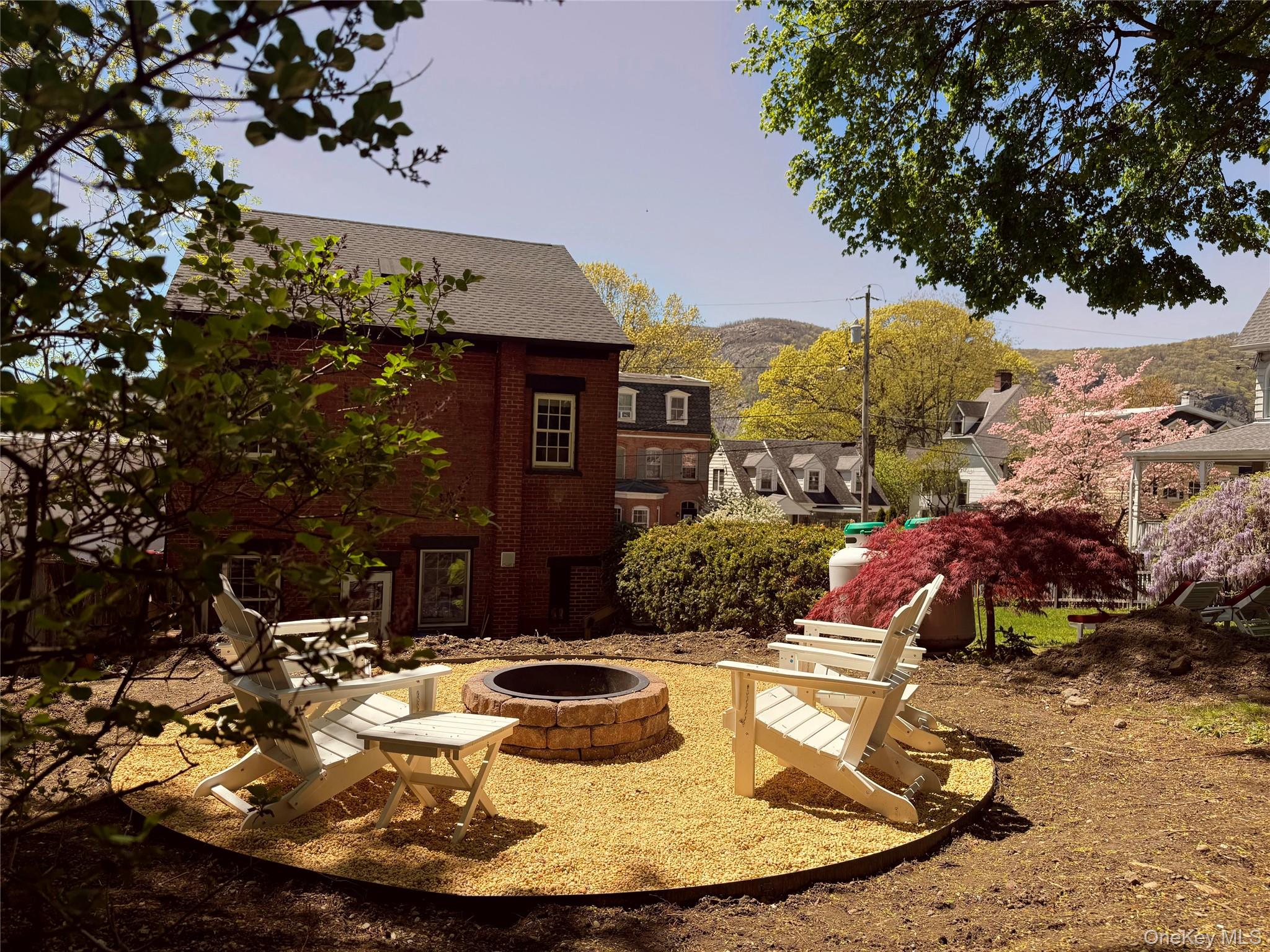 6 Church Street Cold Spring, NY 10516 - Photo 14 of 15 a view of a chairs and table in backyard