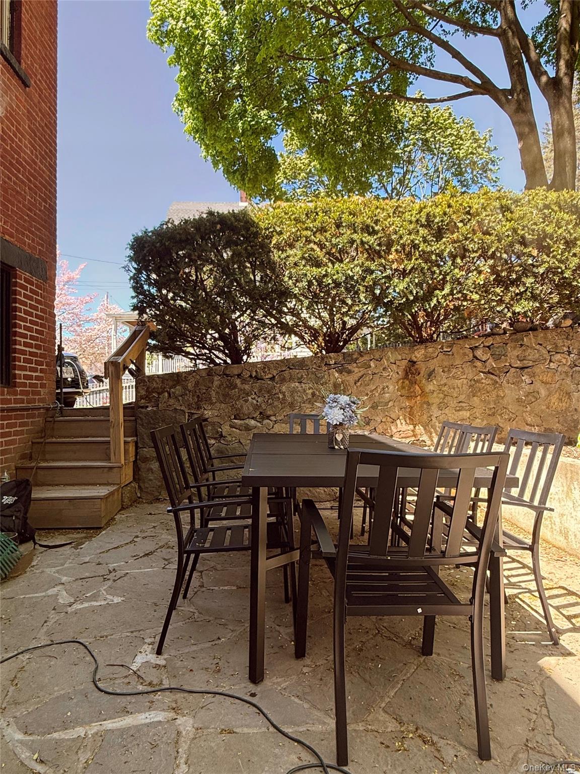 6 Church Street Cold Spring, NY 10516 - Photo 15 of 15 a view of a chairs and table on the terrace