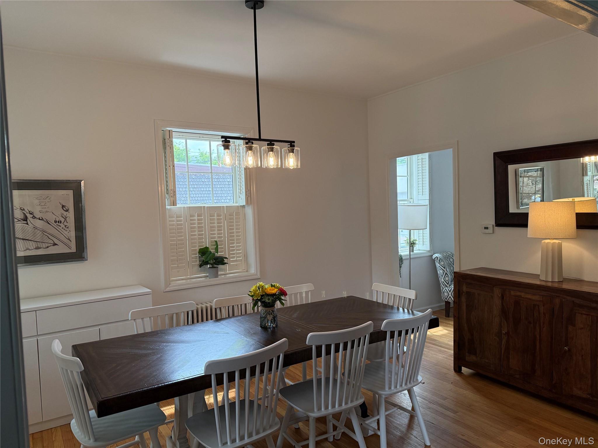 6 Church Street Cold Spring, NY 10516 - Photo 4 of 15 a view of a dining room with furniture window and wooden floor