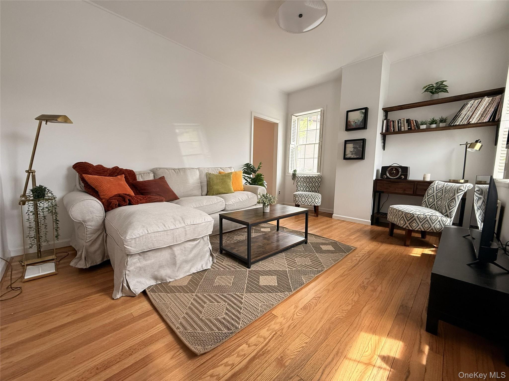 6 Church Street Cold Spring, NY 10516 - Photo 6 of 15 a living room with furniture and a wooden floor