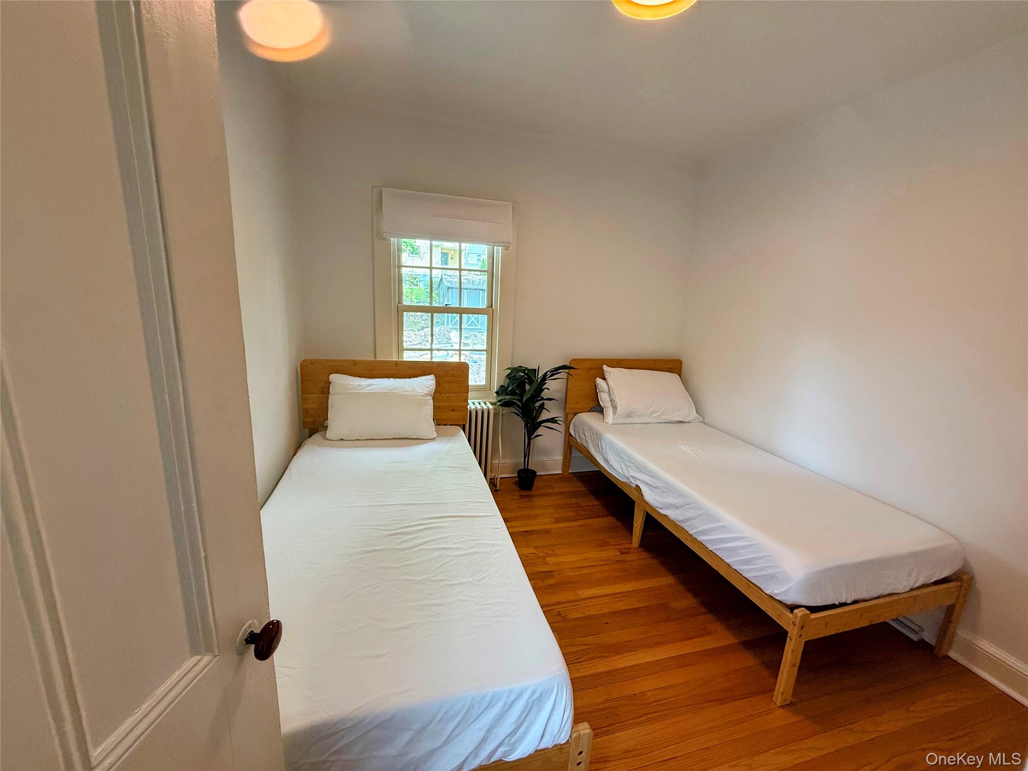 6 Church Street Cold Spring, NY 10516 - Photo 9 of 15 a room with furniture and wooden floor