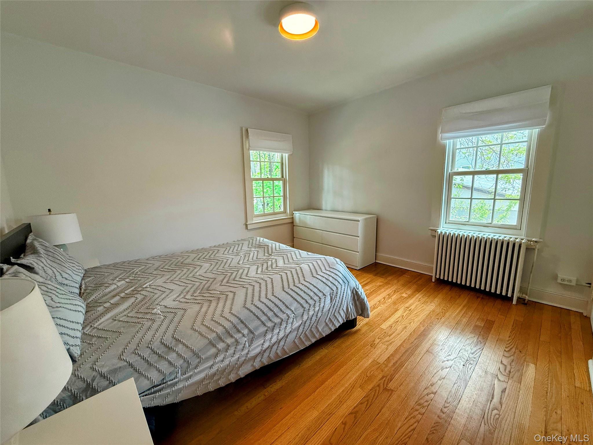 6 Church Street Cold Spring, NY 10516 - Photo 10 of 15 a bedroom with a bed and a window