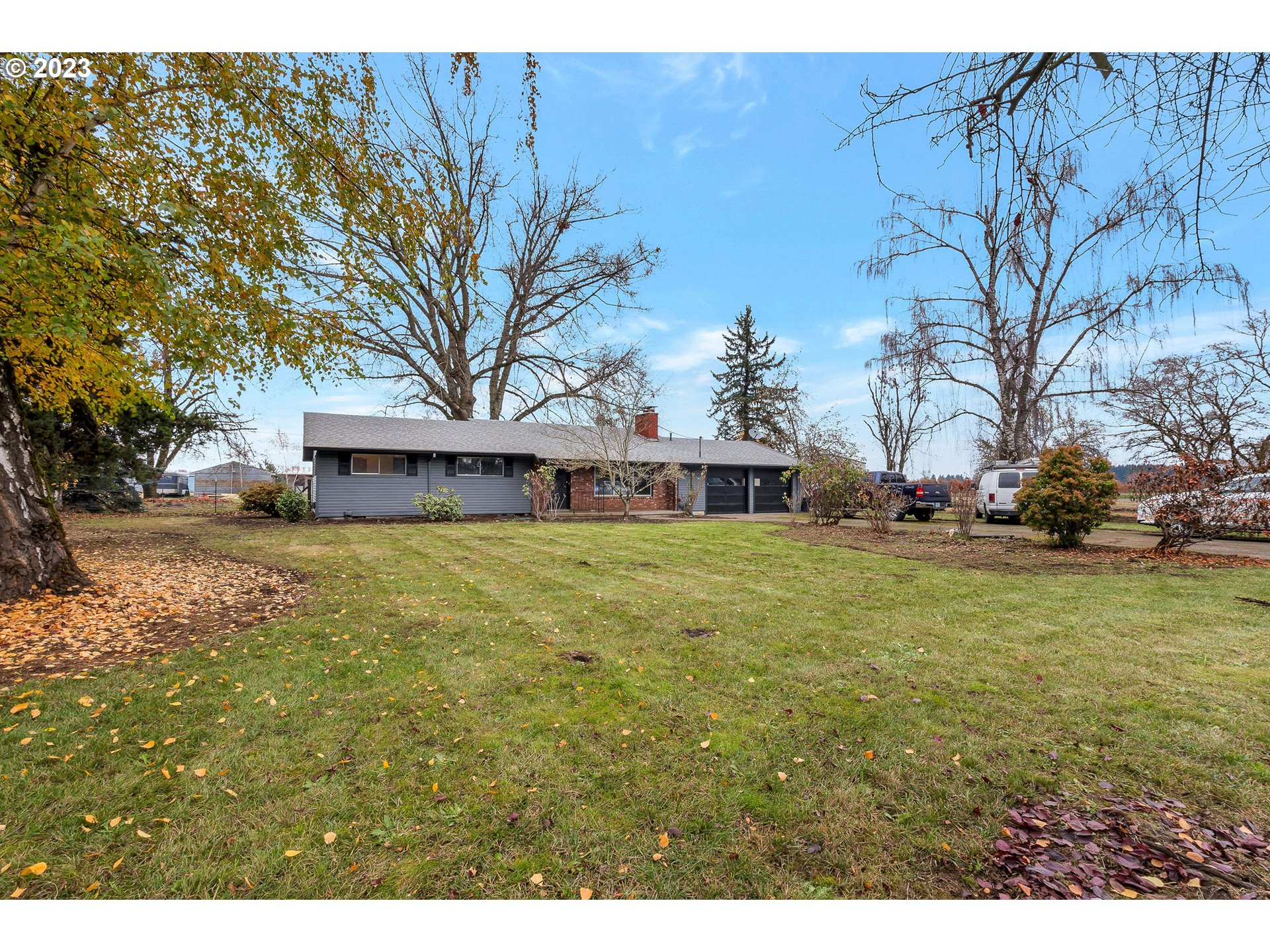 17511 Boones Ferry Road Northeast Hubbard, OR 97032 - Photo 26 of 28 a view of house with outdoor space and garden