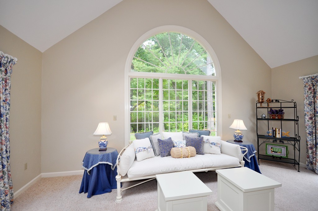 54 Phillips Road Sudbury, MA 01776 - Photo 13 of 30 a living room with furniture and a large window