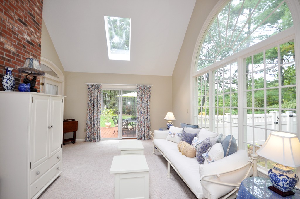 54 Phillips Road Sudbury, MA 01776 - Photo 14 of 30 a living room with furniture and a large window