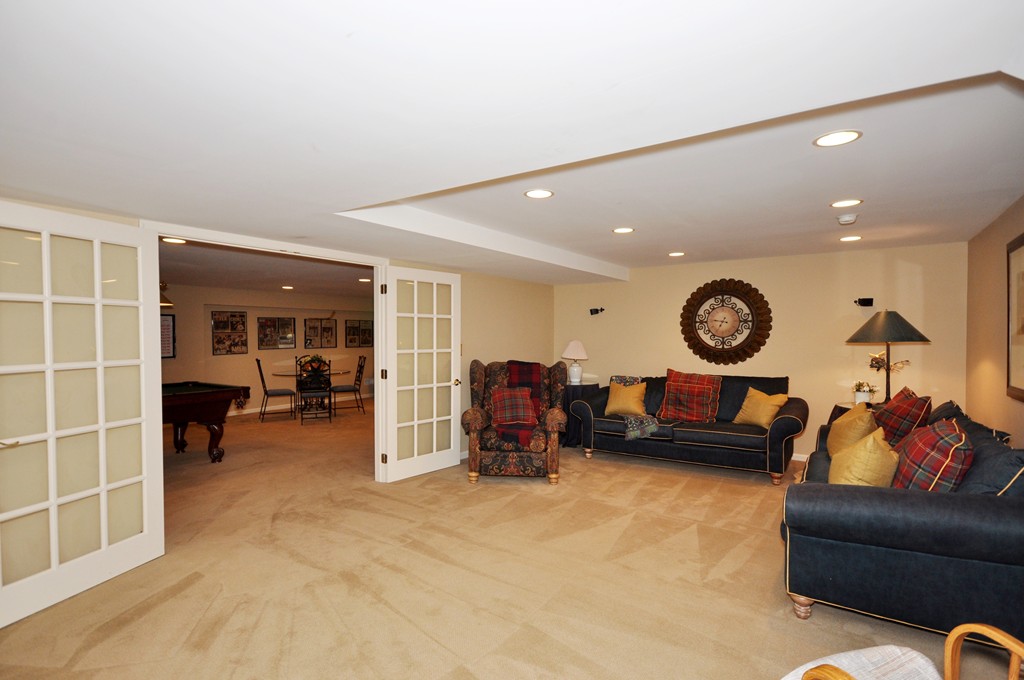 54 Phillips Road Sudbury, MA 01776 - Photo 24 of 30 a living room with furniture and a window