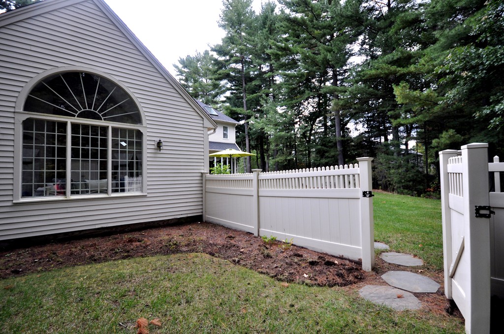 54 Phillips Road Sudbury, MA 01776 - Photo 26 of 30 a view of a house with a yard