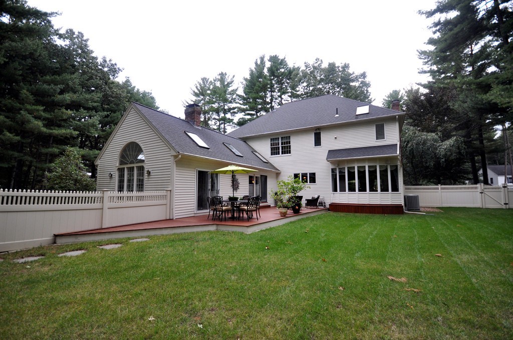 54 Phillips Road Sudbury, MA 01776 - Photo 27 of 30 a view of a house with a yard porch and sitting area