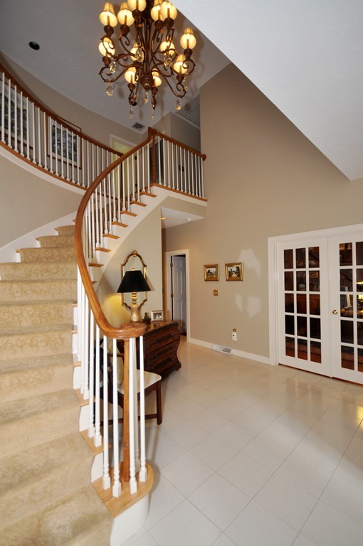 54 Phillips Road Sudbury, MA 01776 - Photo 3 of 30 wooden floor in an empty room with a window