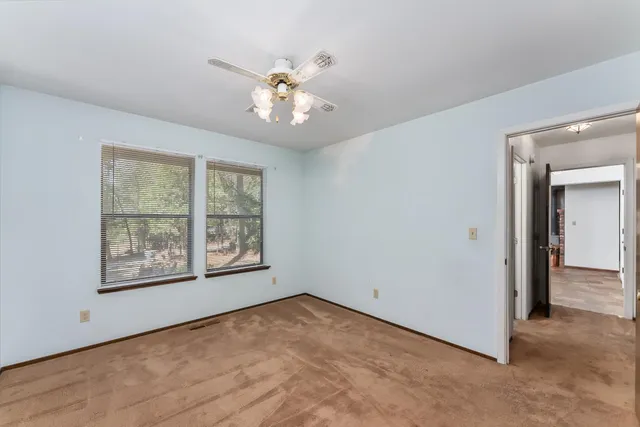 a view of livingroom with furniture and windows