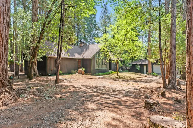 a house with trees in front of it