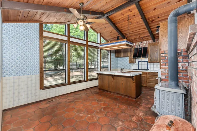 a view of a kitchen with a sink and dishwasher