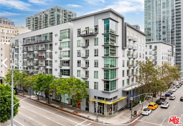 a view of city with tall buildings