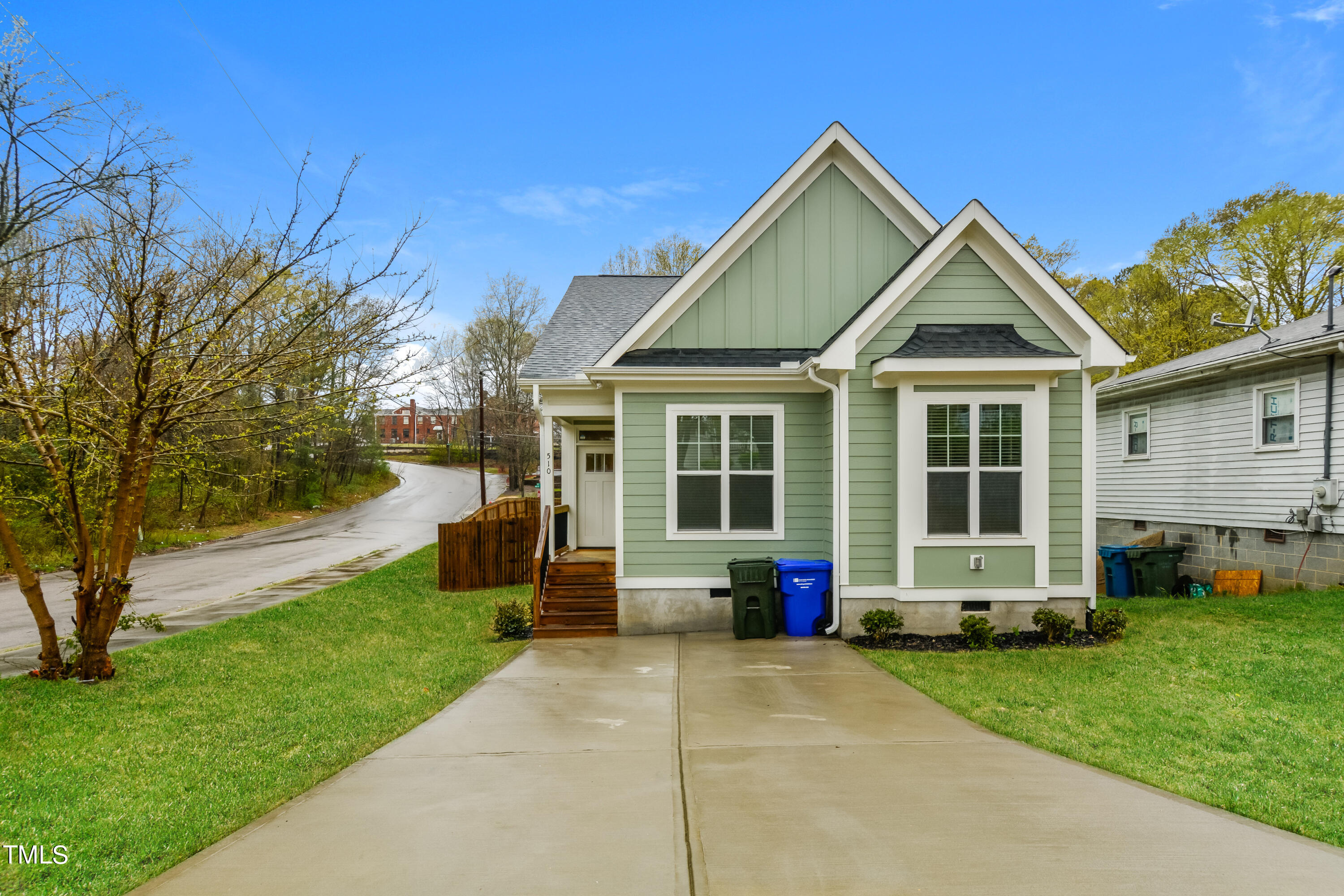510 Eugene Street Durham, NC 27701 - Photo 1 of 15 a front view of a house with a yard table and chairs