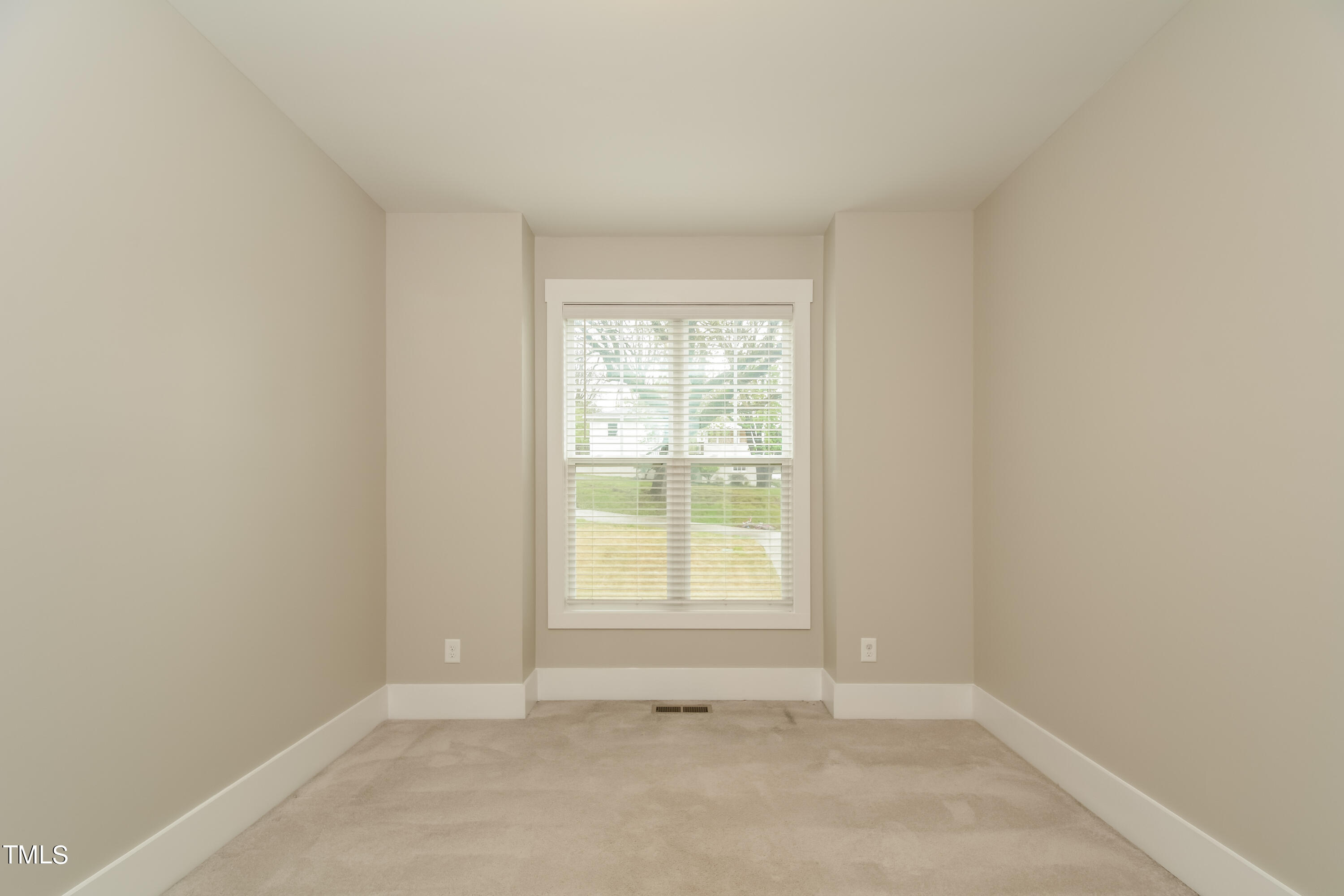 510 Eugene Street Durham, NC 27701 - Photo 9 of 15 an empty room with windows