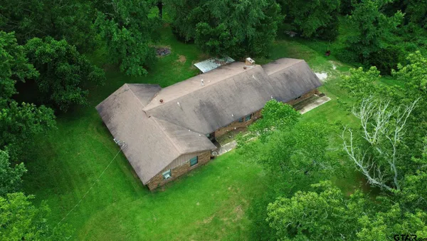a view of a garden with a lake