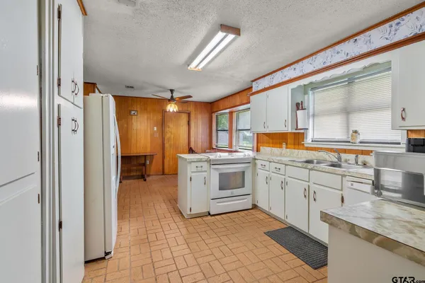 a view of a kitchen with a sink