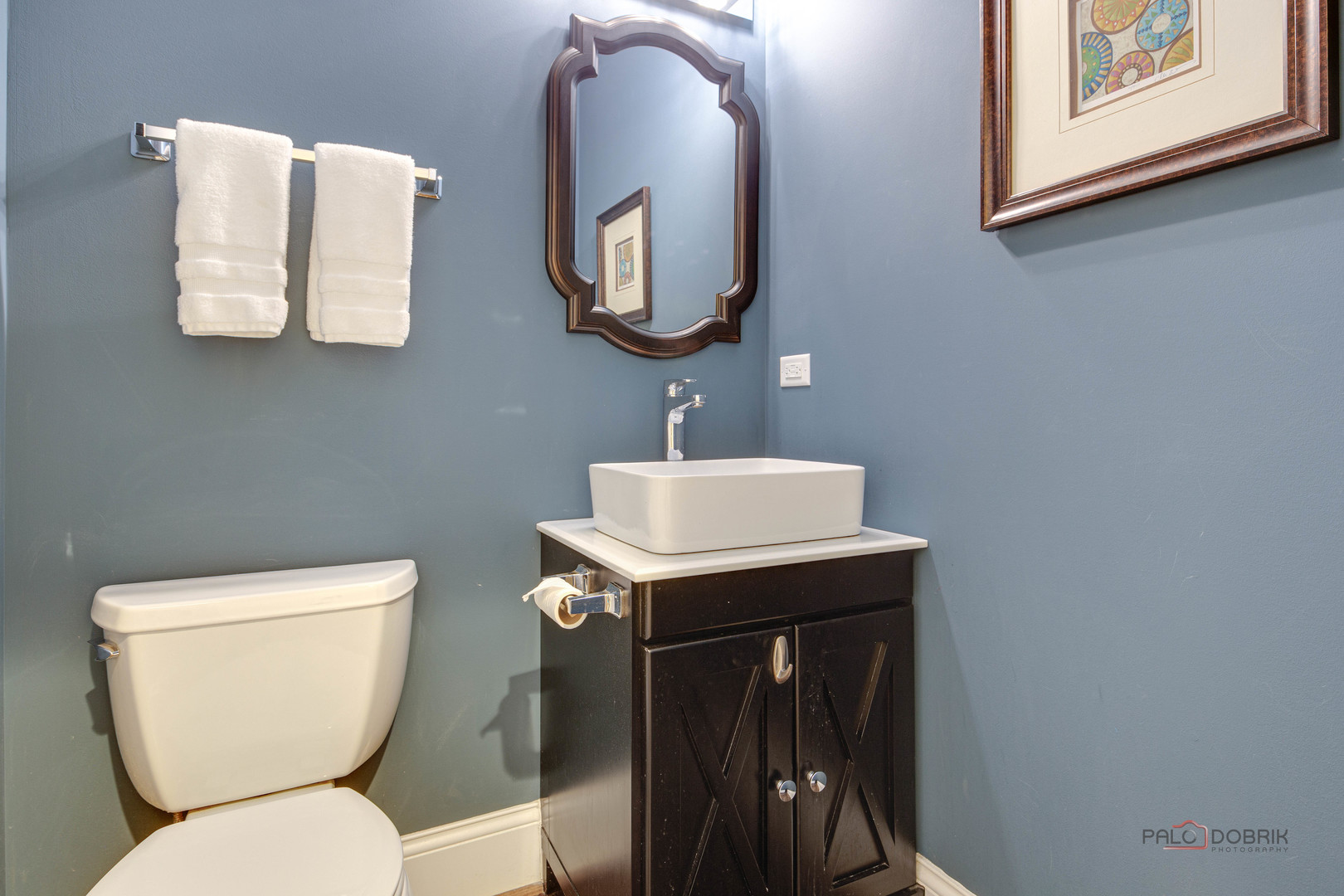 192 Gage Road Riverside, IL 60546 - Photo 21 of 56 a bathroom with a toilet sink and mirror